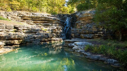 Panoramic view of waterfall over rocks in summer. Princess Louise Falls in Ottawa, Ontario, Canada. - obrazy, fototapety, plakaty