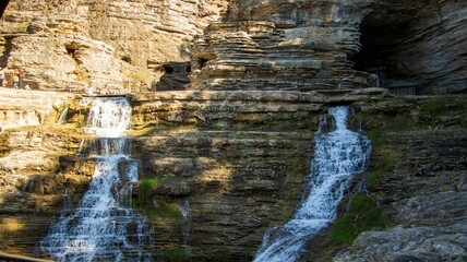 Panoramic view of waterfall over rocks in summer. Princess Louise Falls in Ottawa, Ontario, Canada. - obrazy, fototapety, plakaty