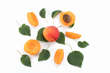 Fresh Apricot fruits isolated on bright background, sliced and whole. Top view.