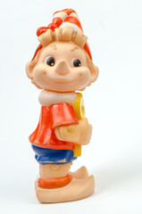 Old rubber toy Pinocchio on a white background. USSR toy