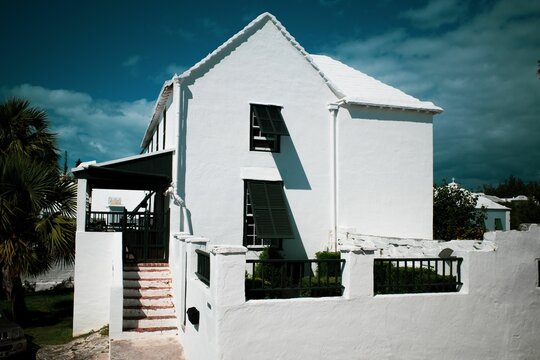 Closeup Shot Of A White Beach House Under The Sunlight