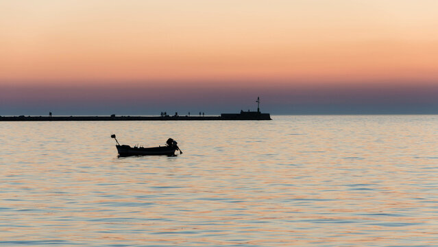 Silhoutte of a pier in Umag port