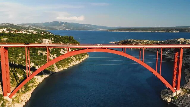 Red Arch Bridge Maslenica Bridge at Zadar, Croatia Aerial view at sunset