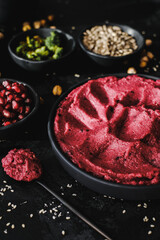 Beetroot hummus and spinach hummus. Vegan recipes, plant-based dishes. Homemade healthy organic food. Vegetarian cuisine. Top view 
