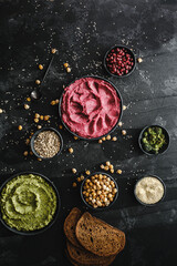 Beetroot hummus and spinach hummus. Vegan recipes, plant-based dishes. Homemade healthy organic food. Vegetarian cuisine. Top view 