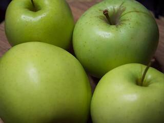 Renet simirenko green apples, top view, close-up. Macro shot of fruit.