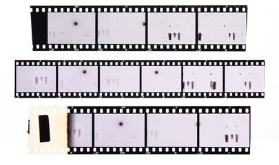 long and underexposed dia positive film strip isolated on white background,35mm film strip
