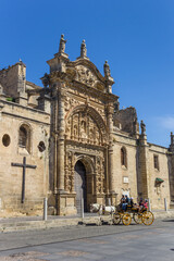 Obraz premium Horse carriage at the Priory church in El Puerto de Santa Maria, Spain