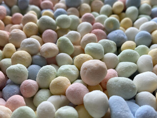 Candy pellets used for making colorful desserts.