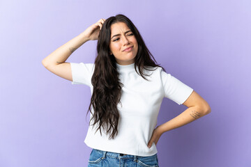 Young caucasian woman isolated on purple background having doubts while scratching head