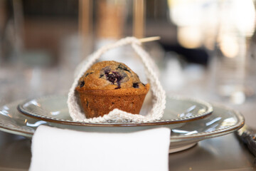 Muffin in plate at wedding table