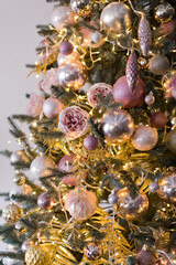 Christmas tree with golden pink decorations