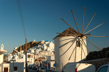 View over famous windmills and Chora town with traditional style white houses on Serifos island in Greece