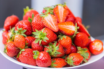 Fresh ripe delicious strawberries in bowl - healthy food and vegetarian