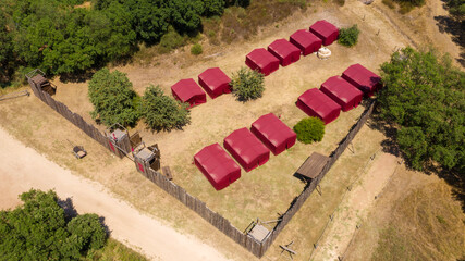 Historical reconstruction of a military camp of ancient Rome. The red curtains were iconic of the...