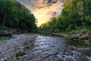 Aerial countryside view - Awesome sunset on the river in the forest, Lombardy, Italy