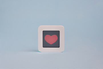 Heart emotion concept, symbol of love on lcd display isolated on colored background, Customer Experience Concept