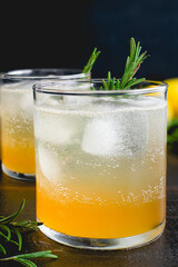 Sparkling Rosemary-Lemon Bourbon Cocktail: American whiskey cocktails served over ice with a rosemary garnish
