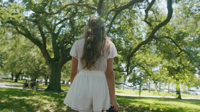 Girl Walking in White Point Garden in Charleston South Carolina