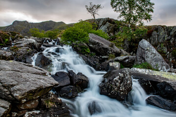Fototapeta na wymiar Small waterfall in Glyderau, Wales, UK.