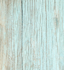 Fototapeta na wymiar old wood surface in peeling paint