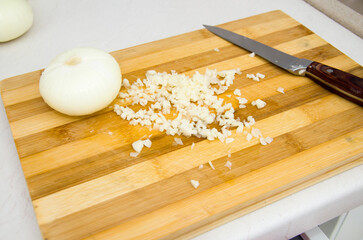 cut onion on a chopping board