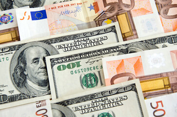 Fototapeta na wymiar Euro and dollar banknotes