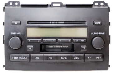 Old car audio CD and cassette player 2 DIN. On a lite background