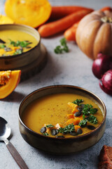 Bowls served with seasonal pumpkin soup	