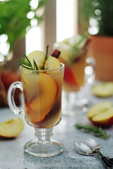 Warm apple autumn drink with cinnamon