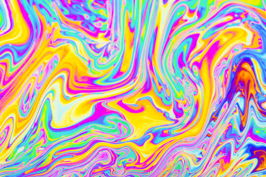 Psychedelic multicolored background abstract. Rainbow colors. patterns background. Photo macro shot of soap bubbles..