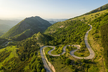 Aerial view of curvy road on monte Nerone slope in Marche region in Italy
