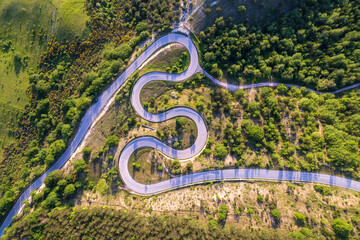 Aerial view of curvy road on monte Nerone slope in Marche region in Italy
