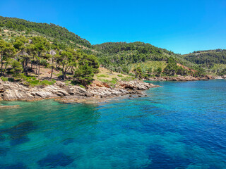 Aerial view over Megali Ammos or large sand beach in western Alonissos island, Greece