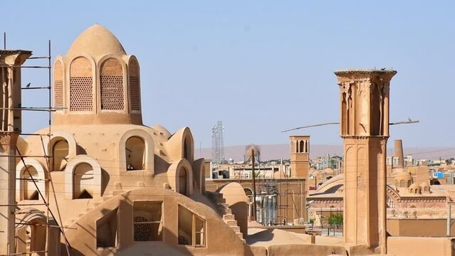 Panning view panorama from Historic castle in Kashan with city buildings background. Explore iran historical heritage concept