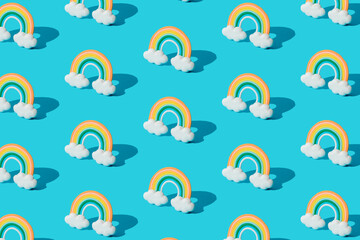 Fototapeta premium Small colorful rainbow cookie with clouds. Pattern.