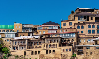 Fototapeta premium facades of houses located in tiers on a steep slope in the village of Chokh in Dagestan