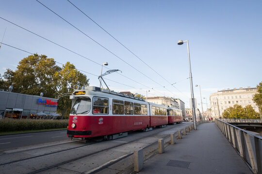 VIENNA, AUSTRIA - NOVEMBER 6, 2019: Vienna tram, also called strassenbahn, an old and traditional modern, passing by on the iconic ringstrasse in the city center of the city