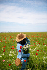 poppy field. beautiful view of the poppy field. girl in the poppy field.