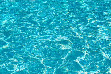 Fototapeta premium Abstract ripple wave and clear turquoise water surface in swimming pool, blue water wave for background and abstract design.