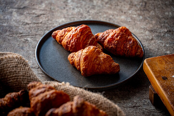 Freshly baked croissants.
Delicious croissants image.