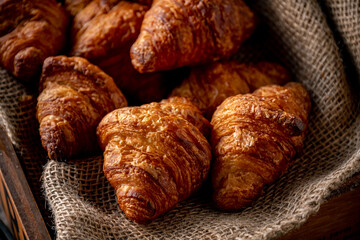 Freshly baked croissants.
Delicious croissants image.