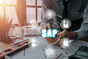 SAP - Business process automation software and management software (SAP), Person hand using smart phone with SAP icon on VR screen, ERP enterprise resources planning system concept on virtual screen. - obrazy, fototapety, plakaty
