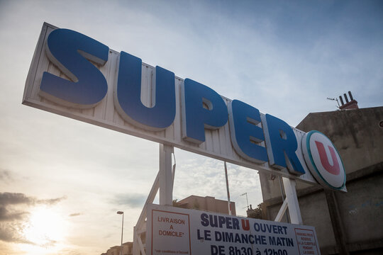 LYON, FRANCE - JULY 18, 2019: Super U logo in front of their local supermarket in Lyon. Super U is a chain of market and supermarket retailers from France, called systeme U as well