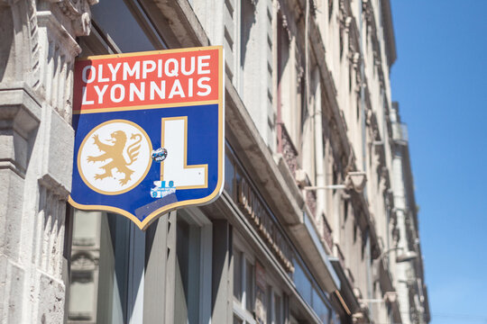 LYON, FRANCE - JULY 19, 2019: Olympique Lyonnais logo in front of their boutique in Lyon. Olympique Lyonnais, or OL, is a Football club, the biggest one of the French city of Lyon