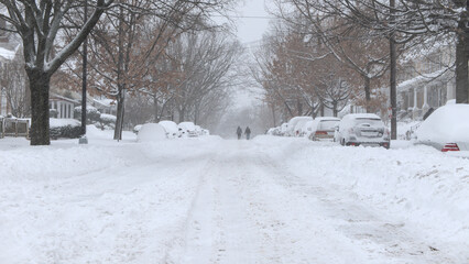 Streets covered by snow during a snow storm in Washington DC NW.
