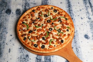 Delivery fast food ordering food online concept. Large set of assorted take out foods pizza, french fries, fried chicken nuggets, burgers, salads, chicken wings, sides, black concrete background