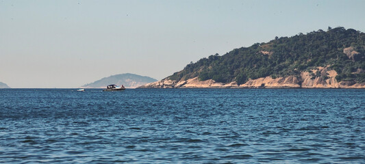 Sugarloaf Mountain cable car monument stone hill forest tree coconut palm sea ocean bay sand beach sport fun wave wet clean transparent horizon landscape boat speedboat fishing sun shine foam splash s