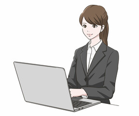 PC操作をするスーツの女性