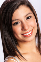 Close-up ortrait of a young teenage girl in a studio